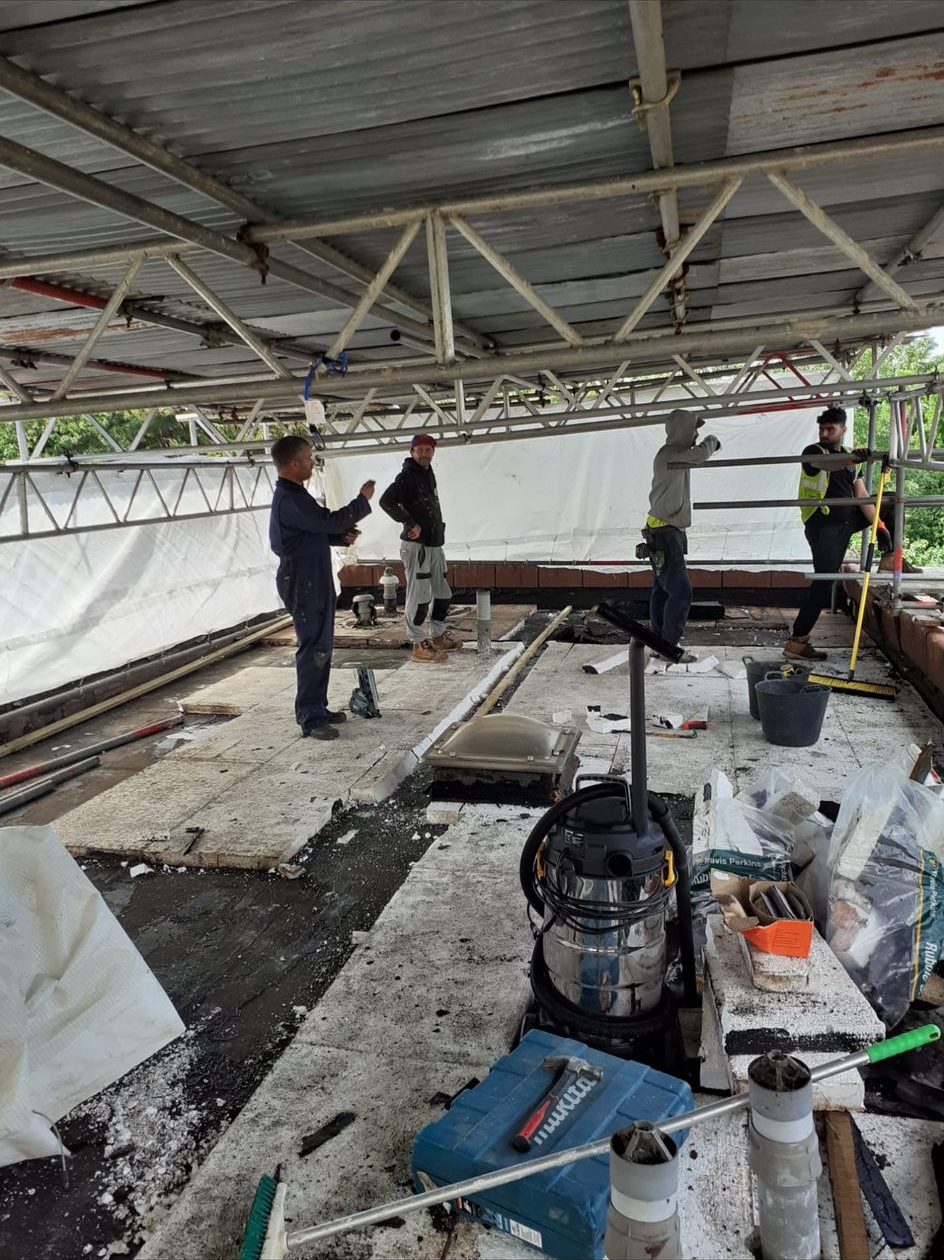 Team working beneath an Oxley temporary roof